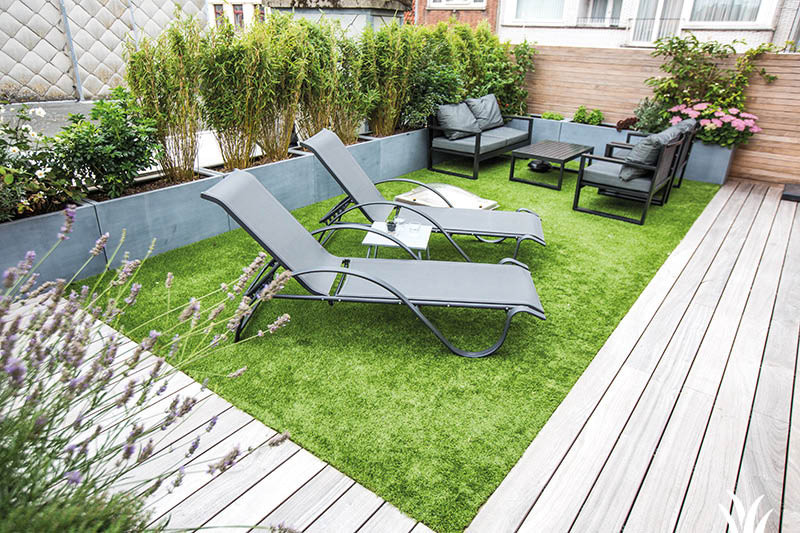 Grasmeester kunstgras - Kunstgras op een terras door middel van een drainbase Grasmeester kunstgras - Kunstgras op een terras door middel van een drainbase