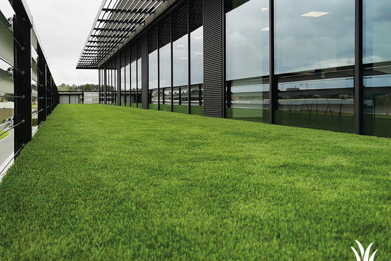 Grasmeester kunstgras - Kunstgras op een terras door middel van een drainbase Grasmeester kunstgras - Kunstgras op een terras door middel van een drainbase