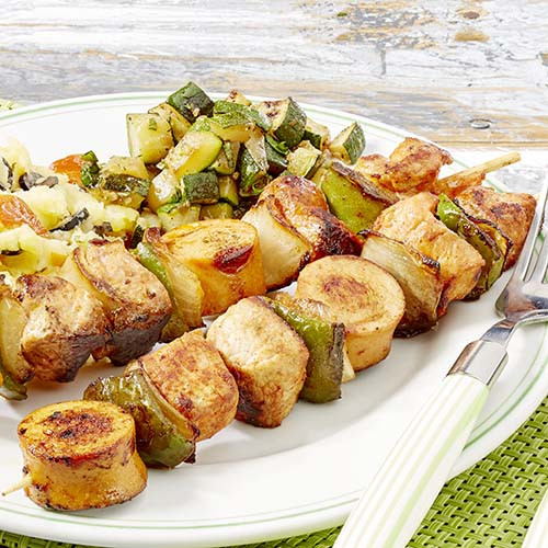 Brochette met gestoofde courgette en zuiderse puree