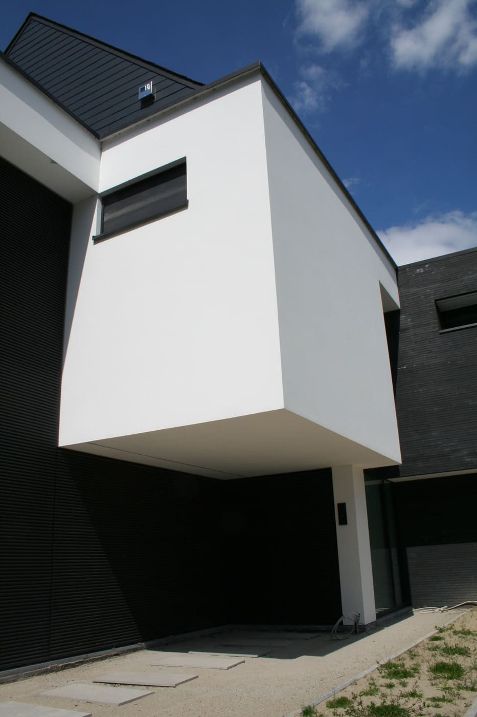 moderne-woning-wit-gladpleister
